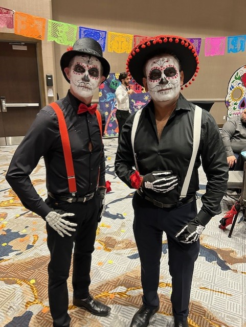 Dr. Fabricio Medina-Bolivar attending El Centro Hispano annual Dia de los Muertos Celebration